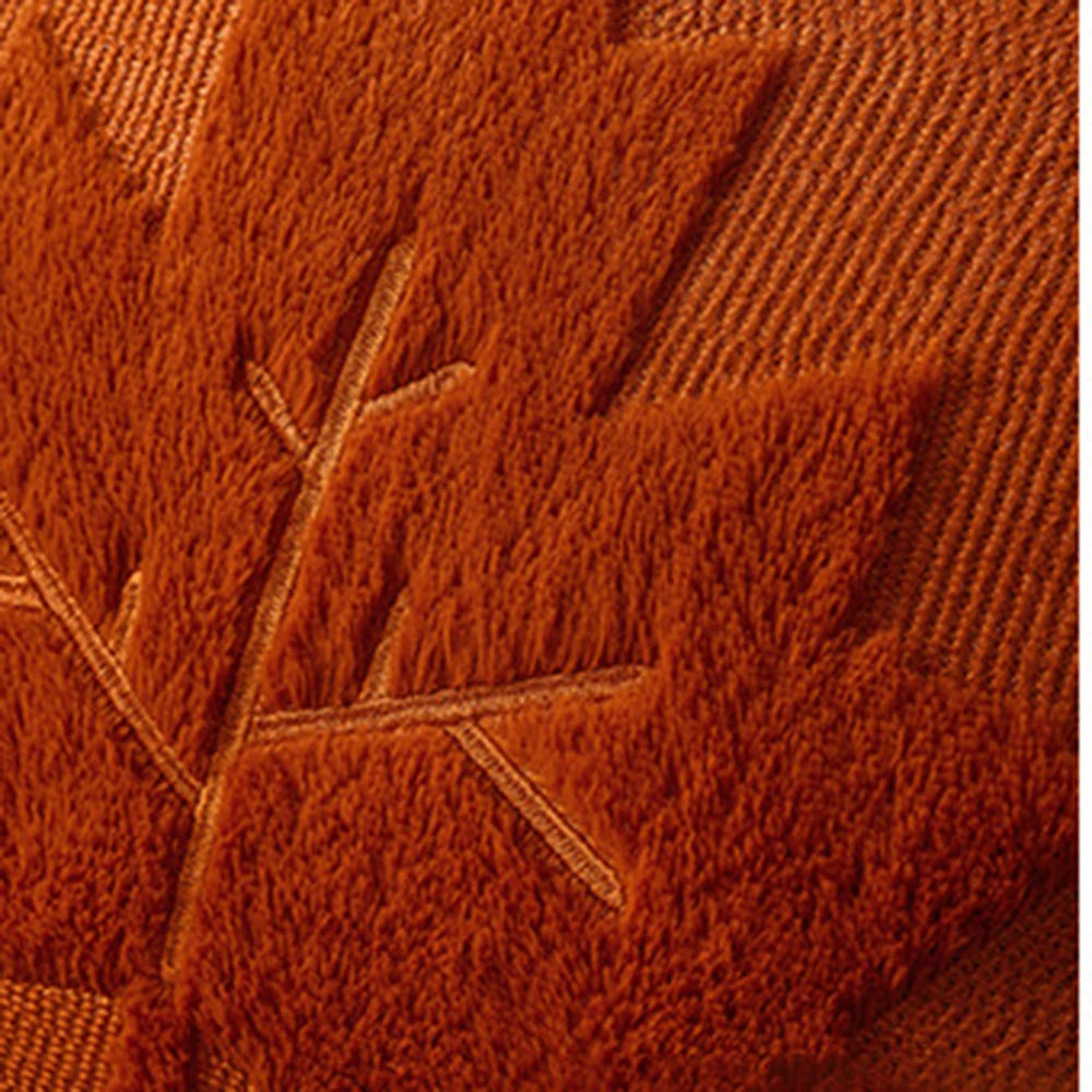 Close view of the raised maple leaf texture