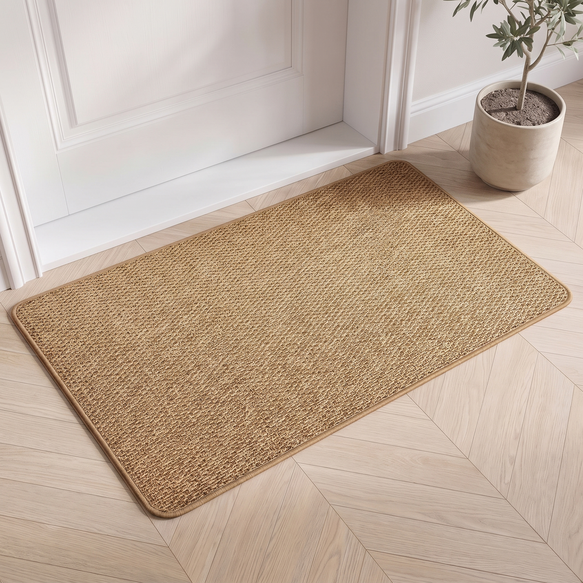 Faux jute door mat in natural inside a white front door