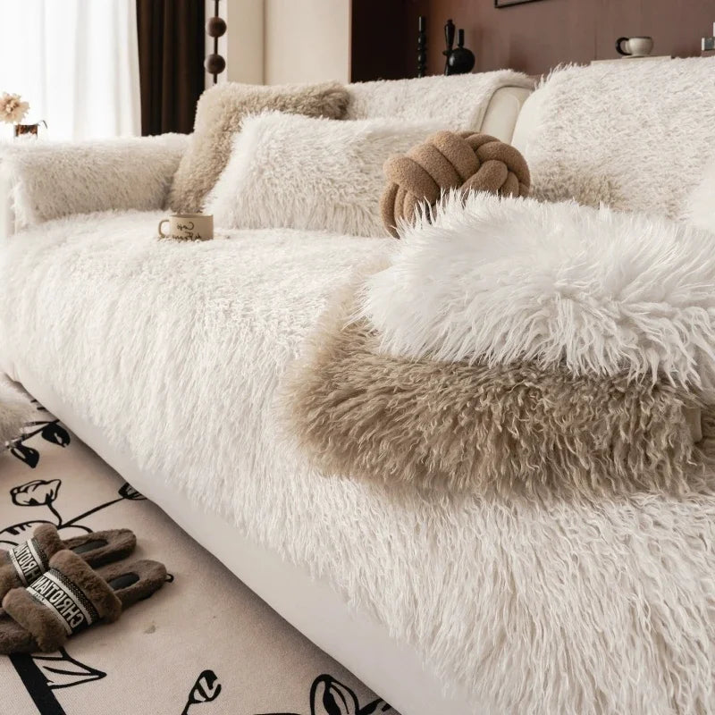 Off white faux lambswool covers on a sofa and cushion