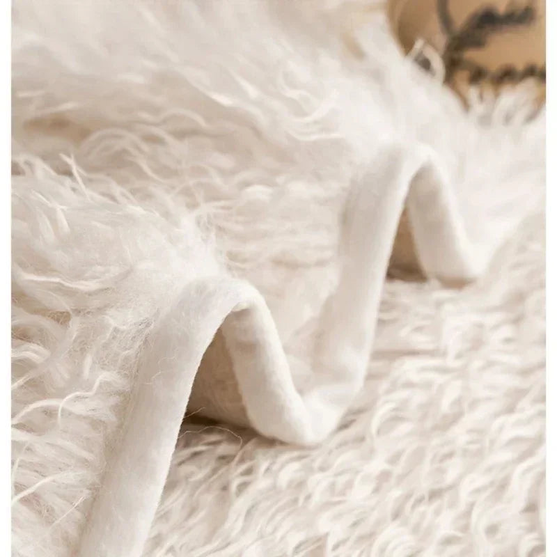Close view of the faux lambswool cover edge folded back