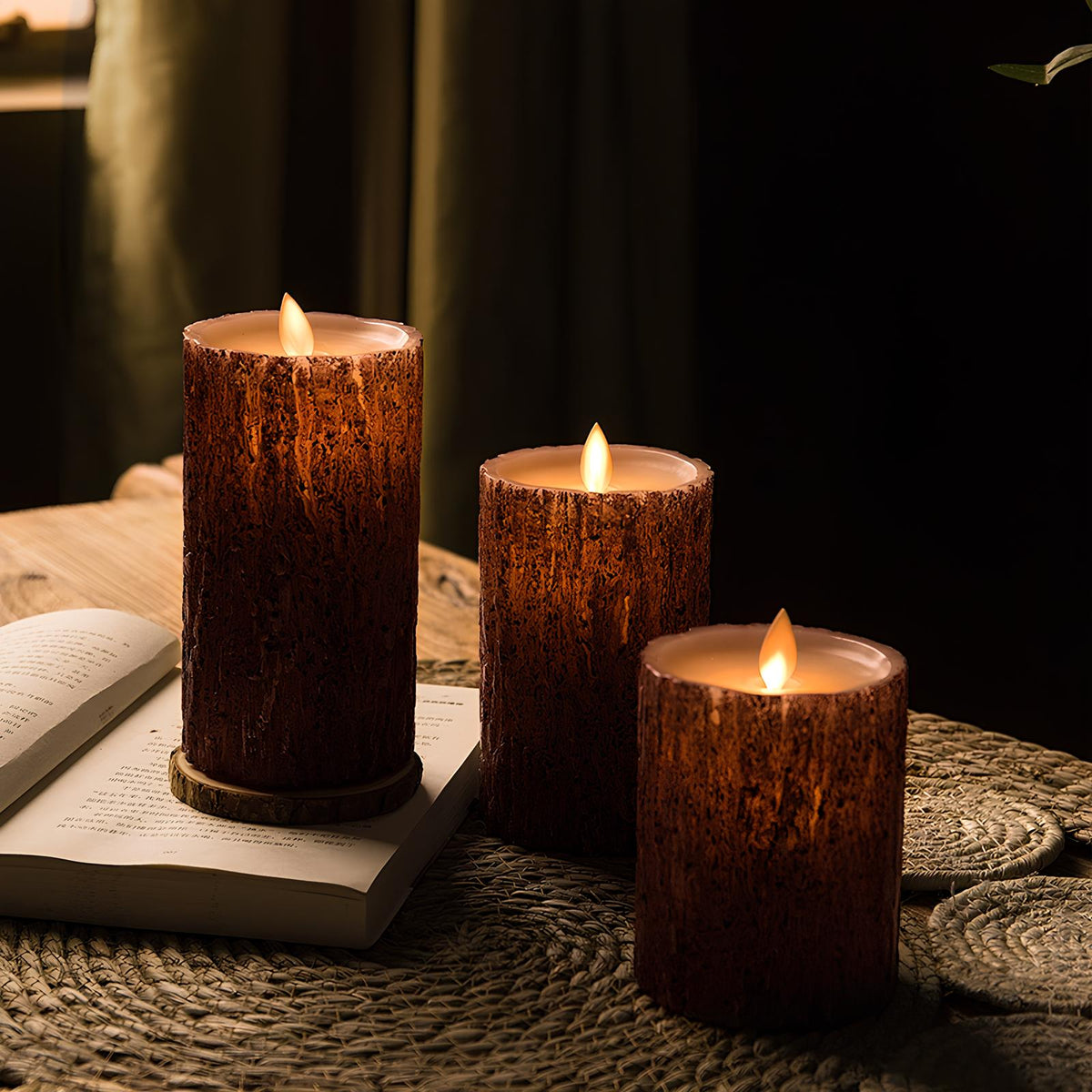 Three bark finish flameless candles lit