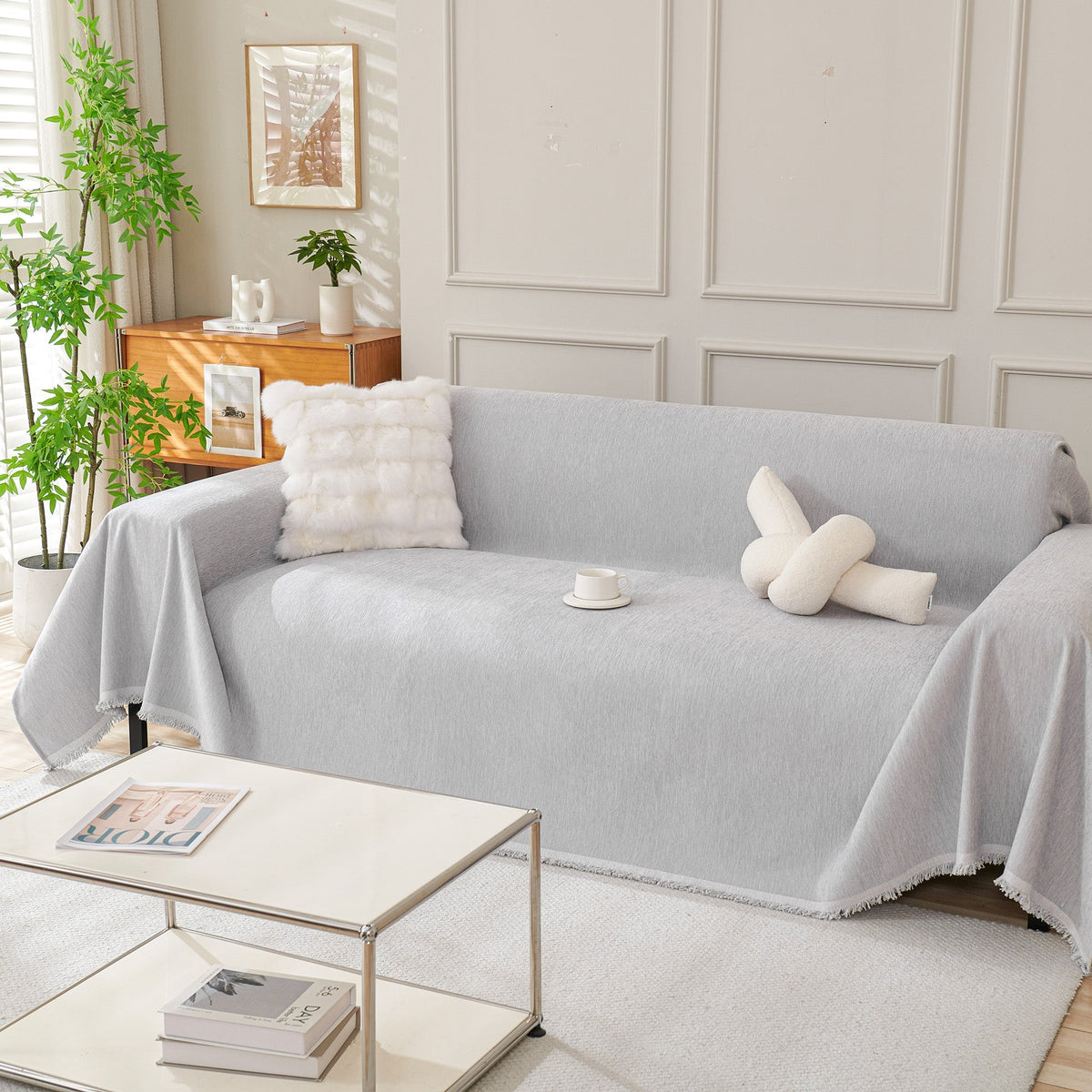 Light gray woven cover with a knot pillow