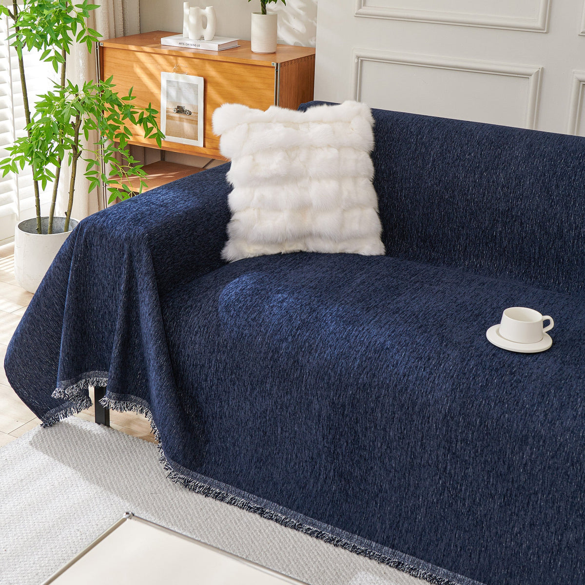 Navy blue woven cover with a cup on the seat