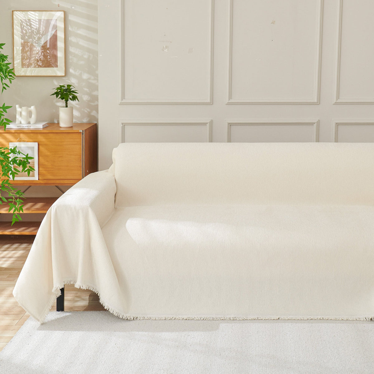 Cream woven cover tucked over a sofa seat