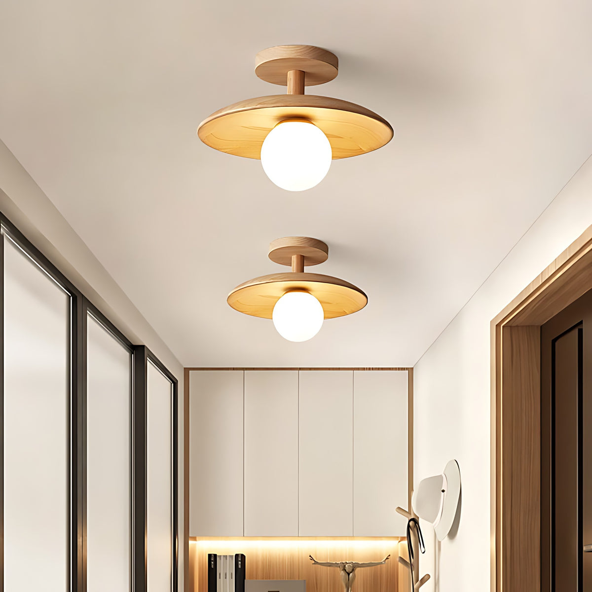 Two Gerda semi flush ceiling lights lit down a hallway