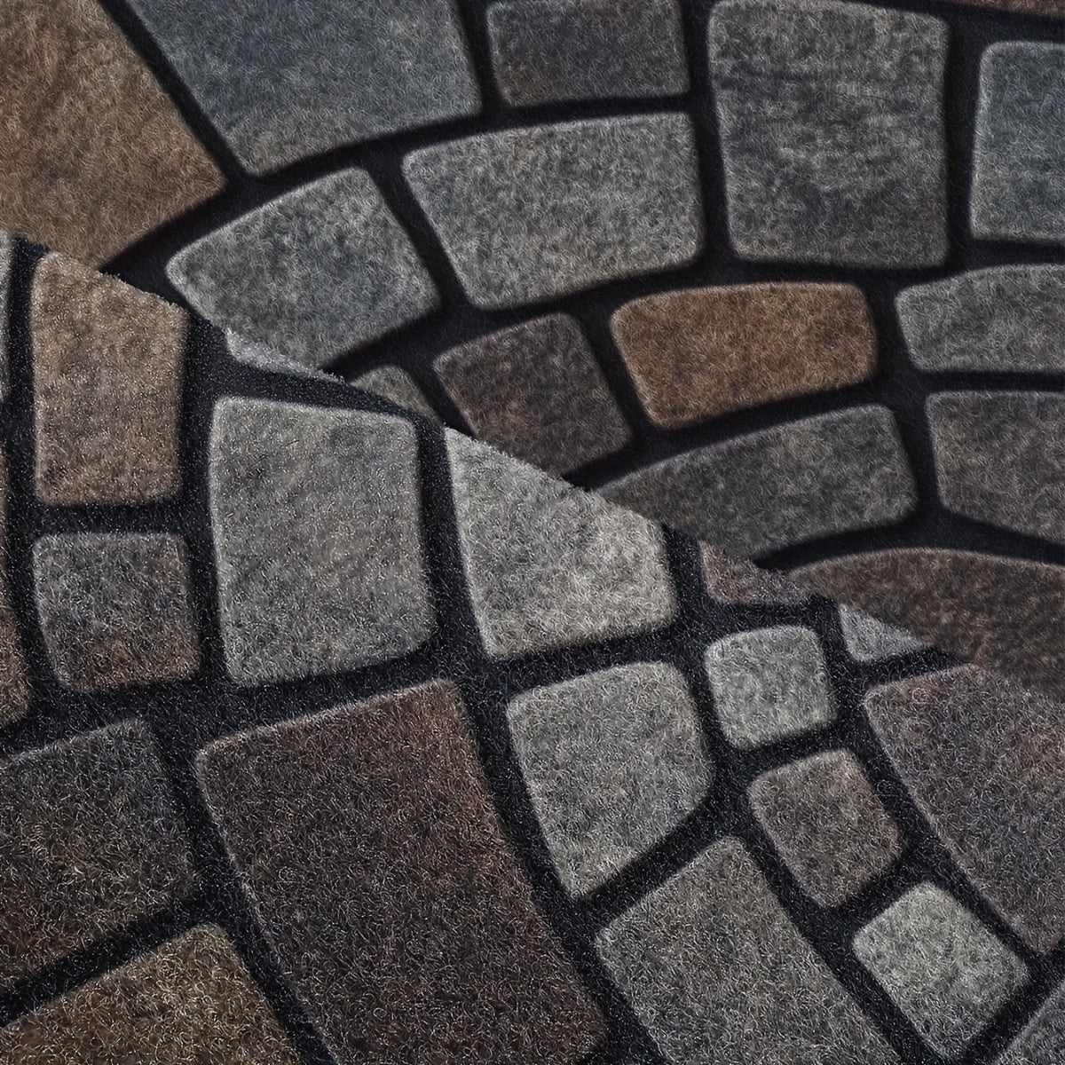 Close view of the stone look pattern and dark border on the door mat