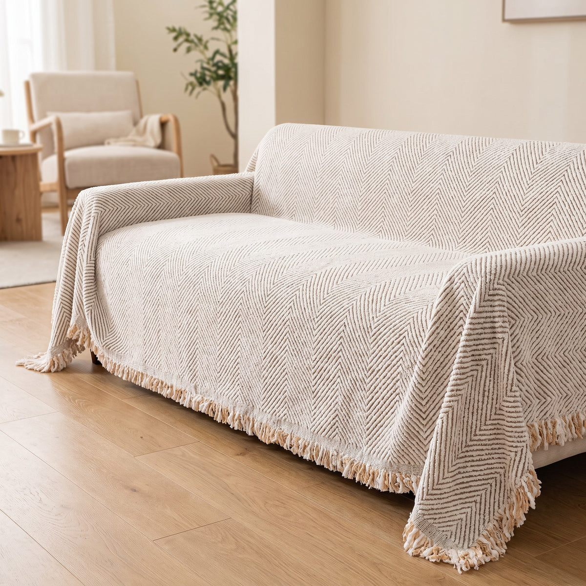 Couch Cover in Ivory on a sofa, tuck it and it stays