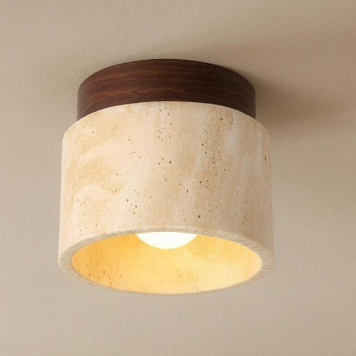 Jonna ceiling light, travertine drum with a walnut trim, lit