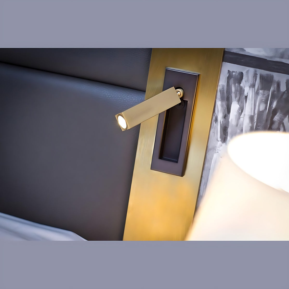 Kaia LED reading wall light beside a headboard with the beam on the bed