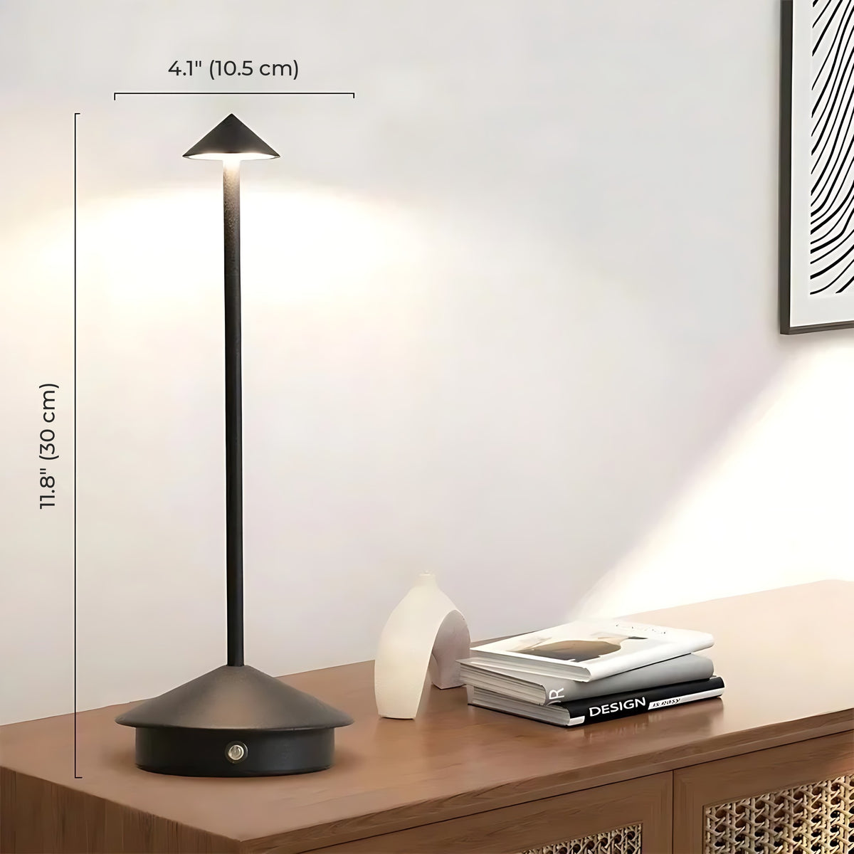 Black Lene cordless table lamp lit on a sideboard