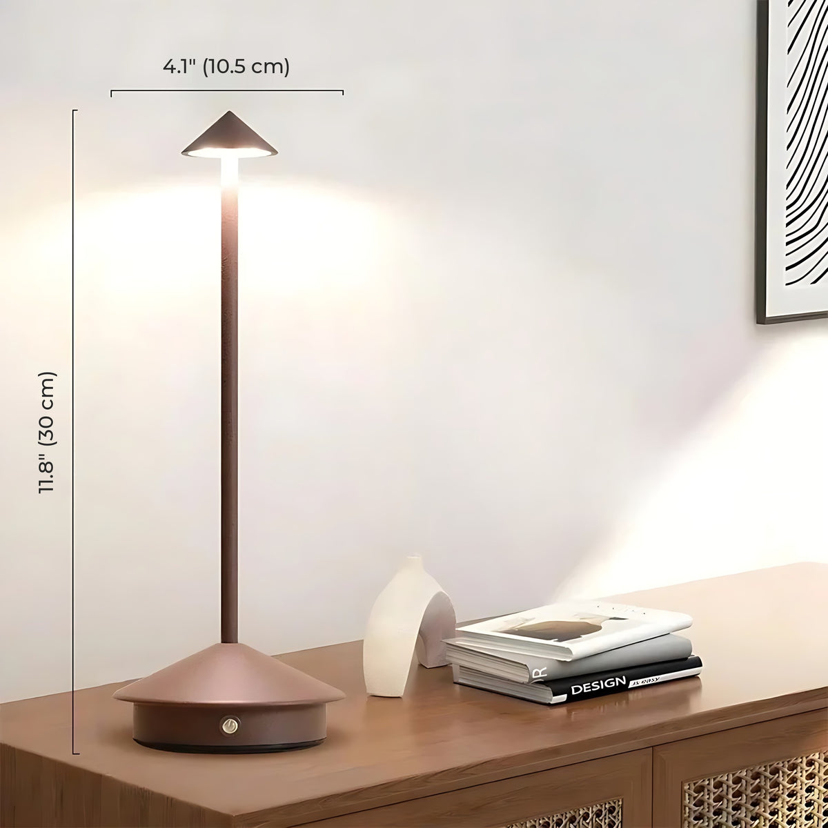 Brown Lene cordless table lamp lit on a sideboard