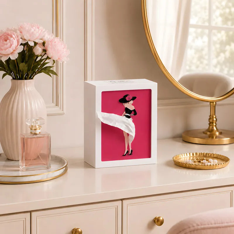 Lighted tissue box in Couture on a vanity with a mirror