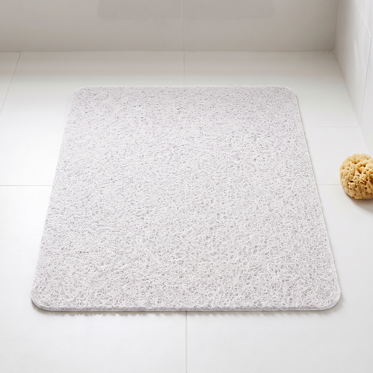 White loofah shower mat