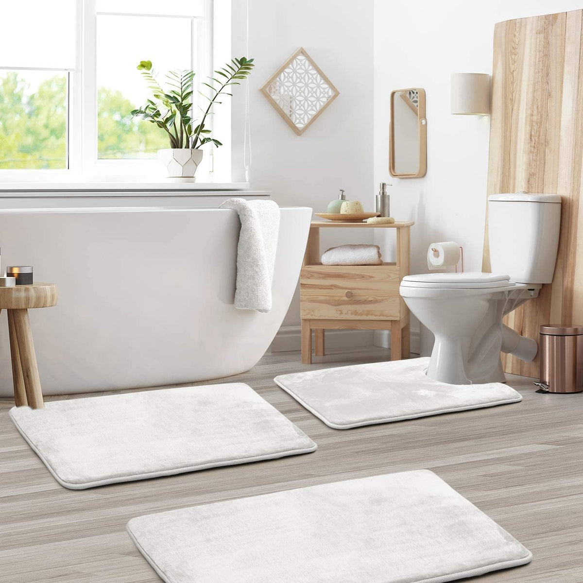White bath mat set in a bathroom