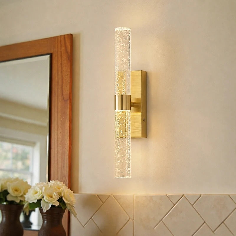 Namsos wall light beside a wood framed mirror
