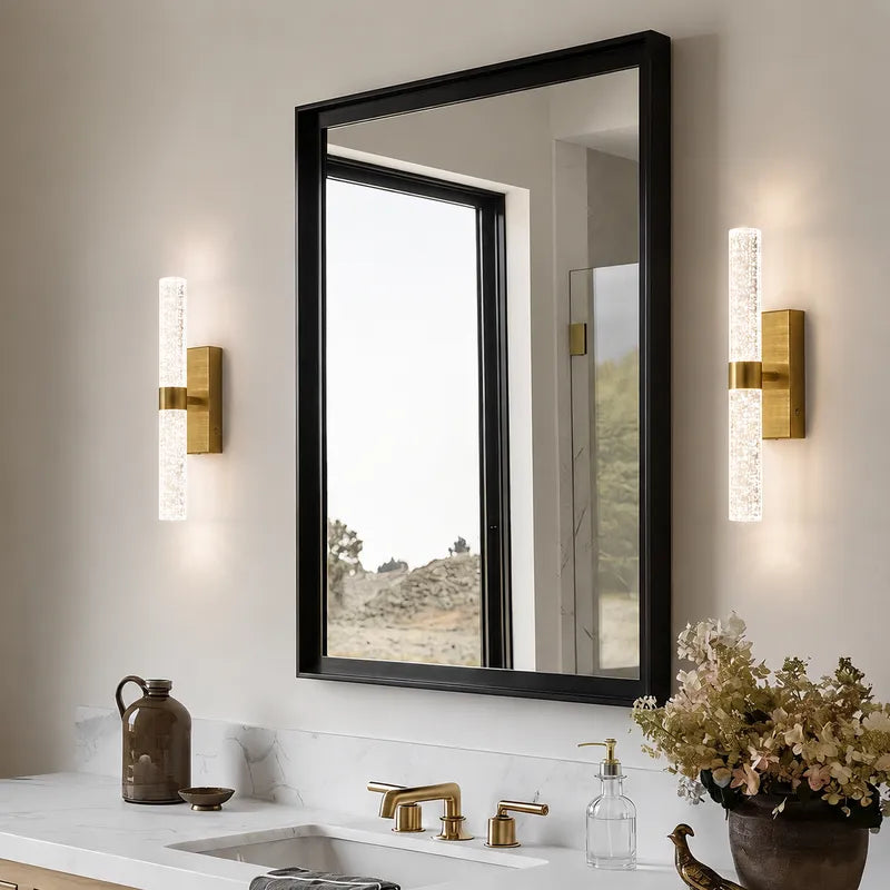 Pair of Namsos wall lights flanking a vanity mirror