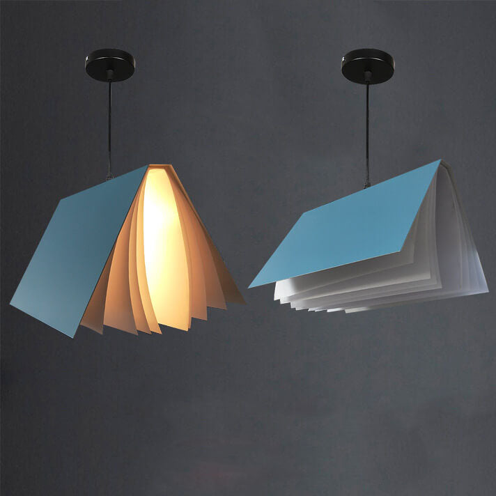 Two blue book pendants with black ceiling canopies, one seen from the side and one from the end