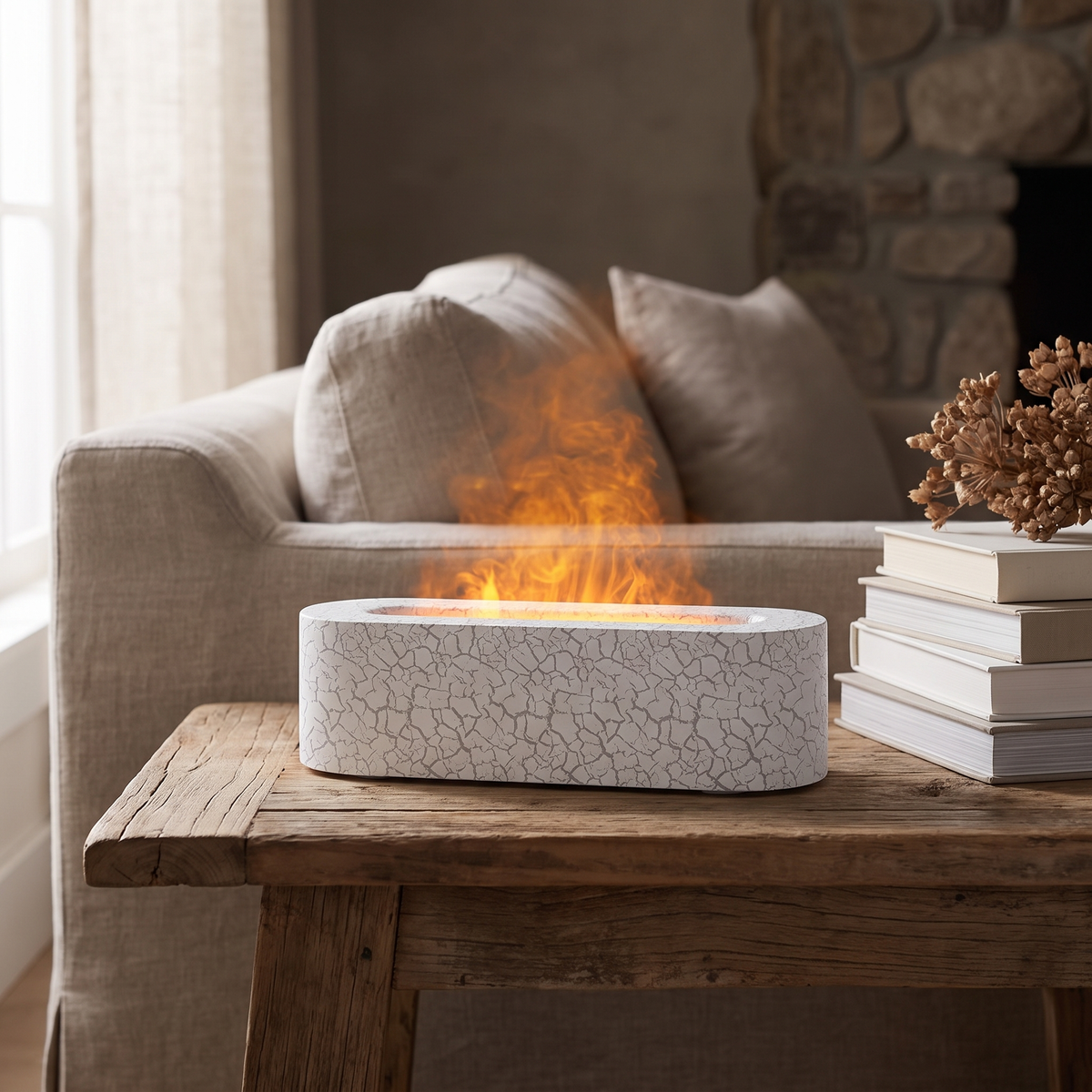 Nybro humidifier with flame lit mist on a wood coffee table by a sofa