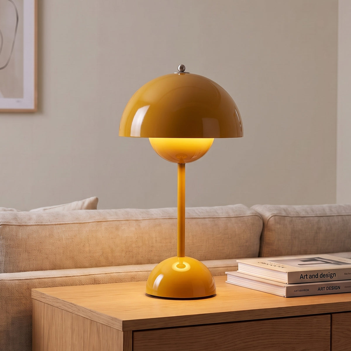 Oona table lamp in Yellow on a sideboard beside a sofa