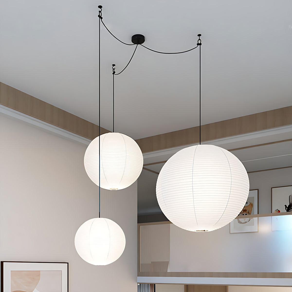Pia pendant light, white washi paper globe in a group of three at different heights