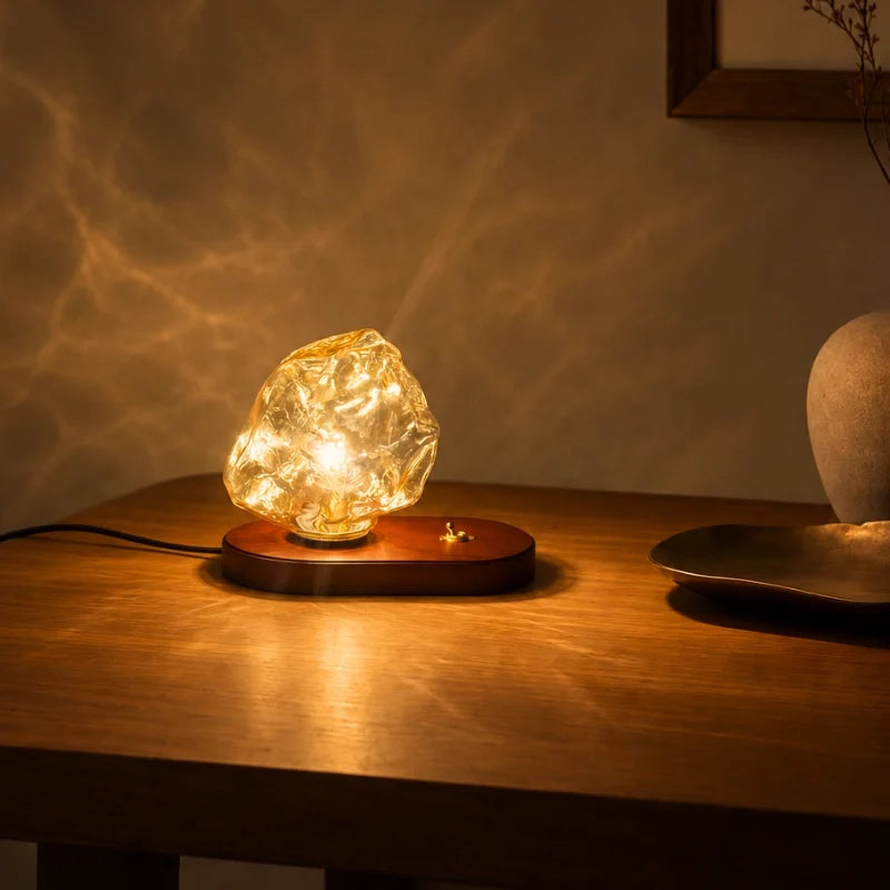 Ribe lamp casting rippled light across a wall