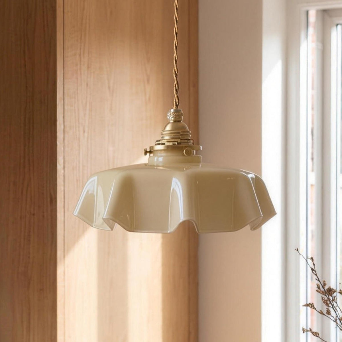 Ronja pendant light in beige glass over a kitchen table