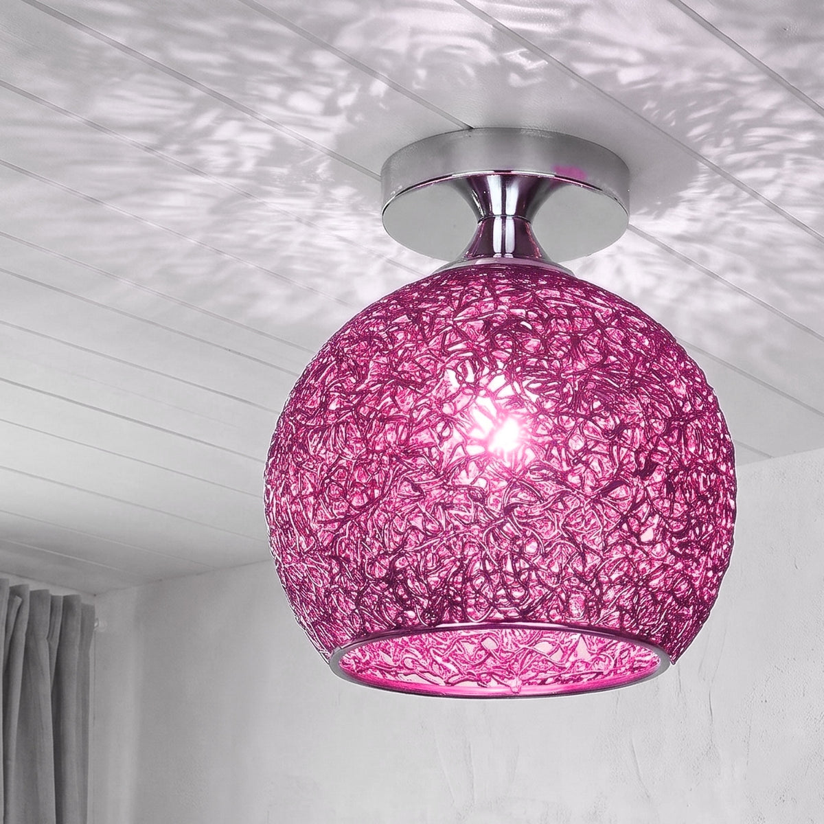 Purple Saara wire dome ceiling light lit in the same room