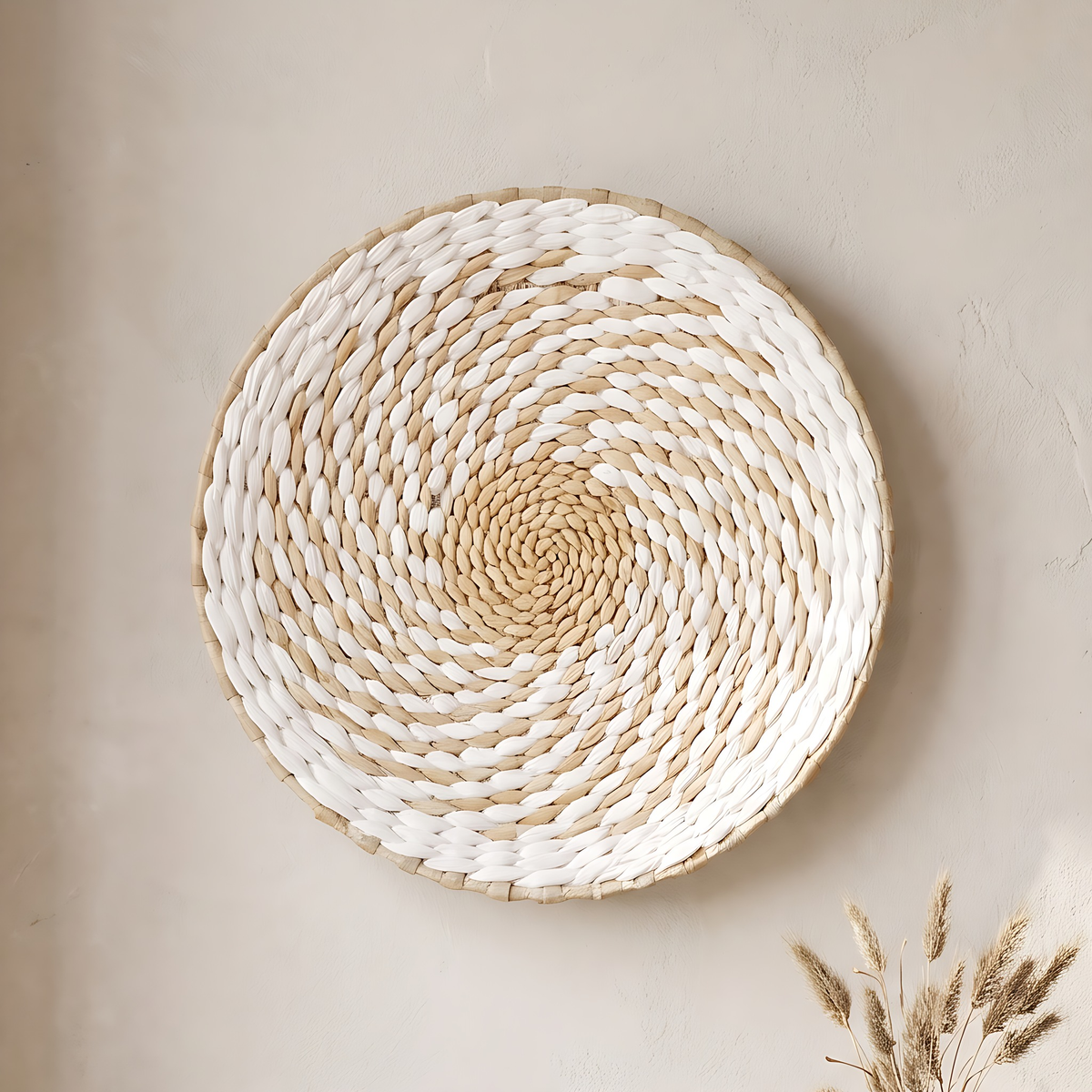 Sanne seagrass wall basket in White Swirl, 11.8", on a warm white limewash wall