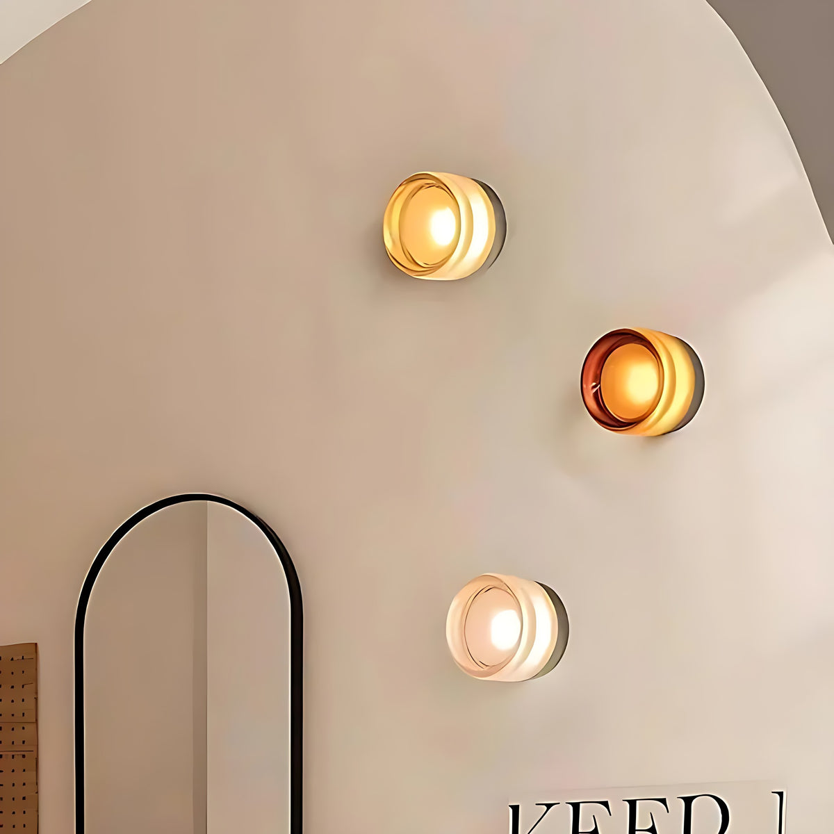 Several Siv LED wall sconces on a hallway wall