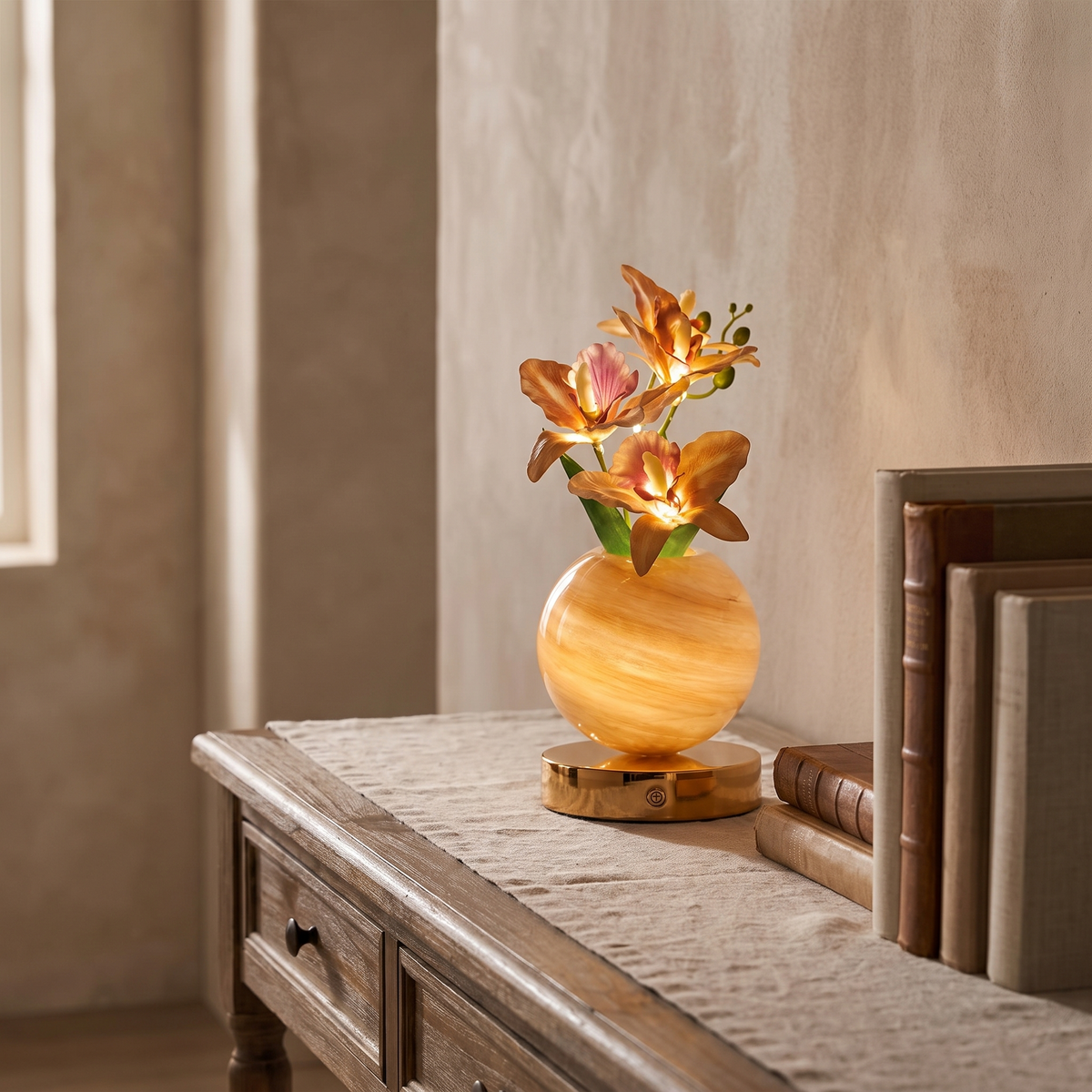 Solna orchid blossoms and amber glass vase glowing in a hallway