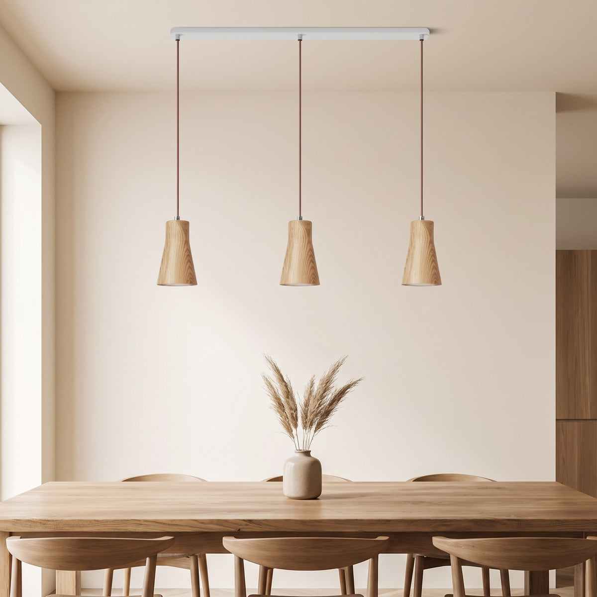 Svea wood pendant light, three cone shades on one canopy over a dining table