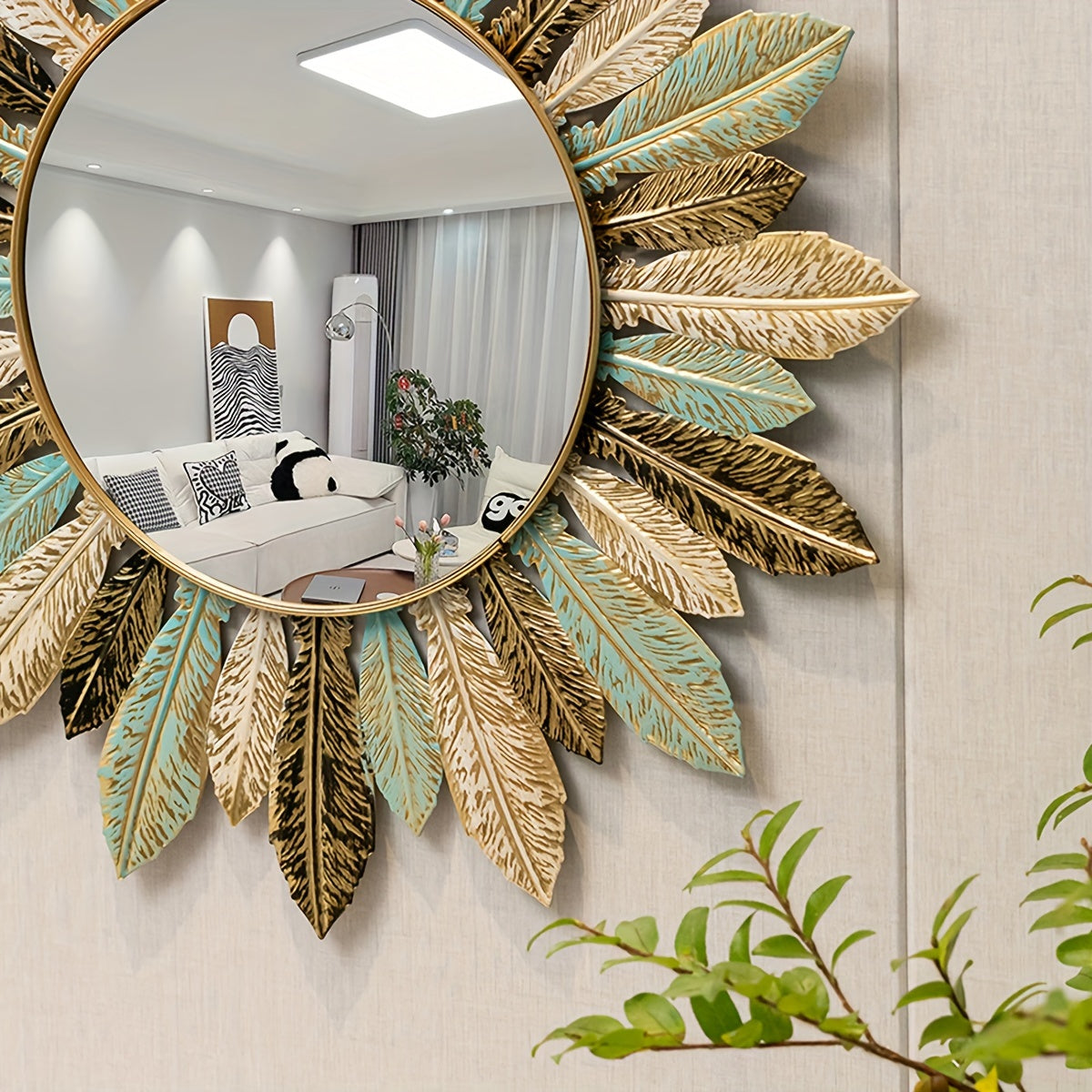 Close view of the Tinn mirror glass and layered metal leaves