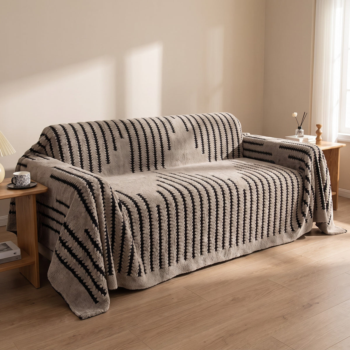 Sofa Cover in Taupe on a sofa, drapes over every cushion