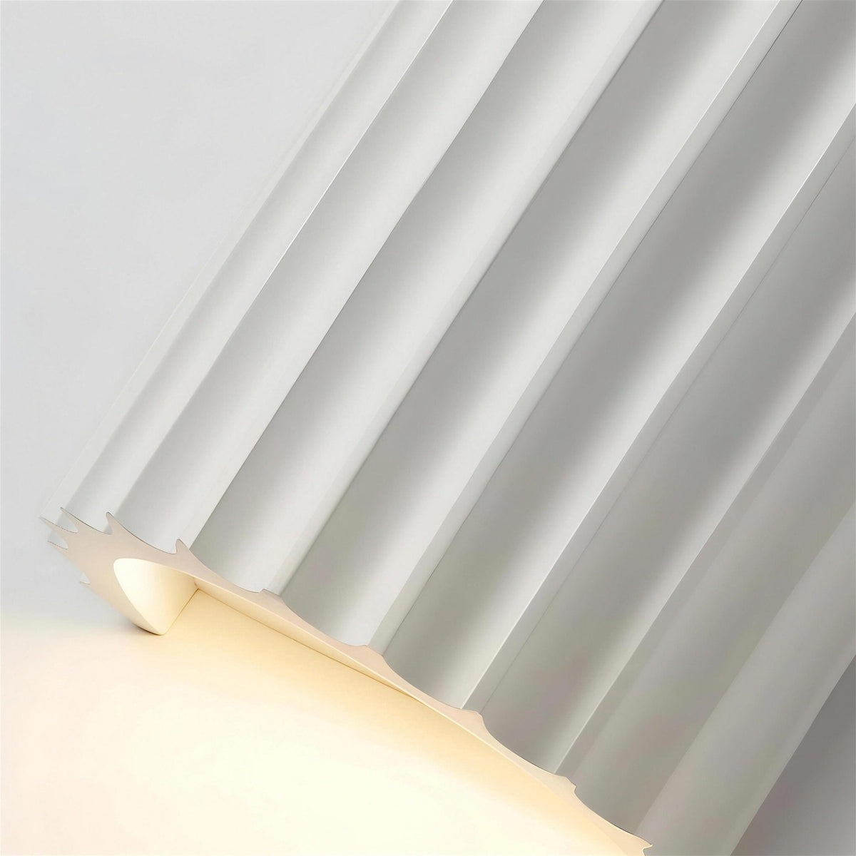 Close view of the fluting on the Unni LED wall sconce