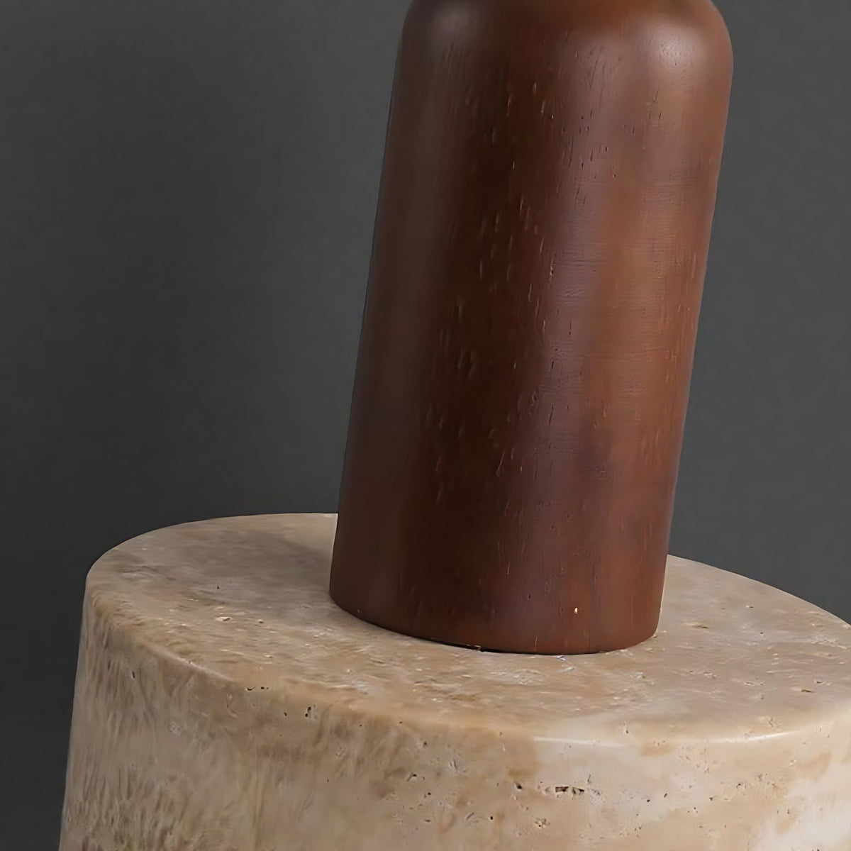 Close view of the walnut top on the travertine shade