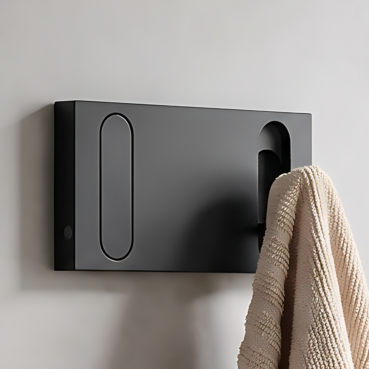 Black wall hook rack, 2 hooks, 6.7", on a warm plaster wall