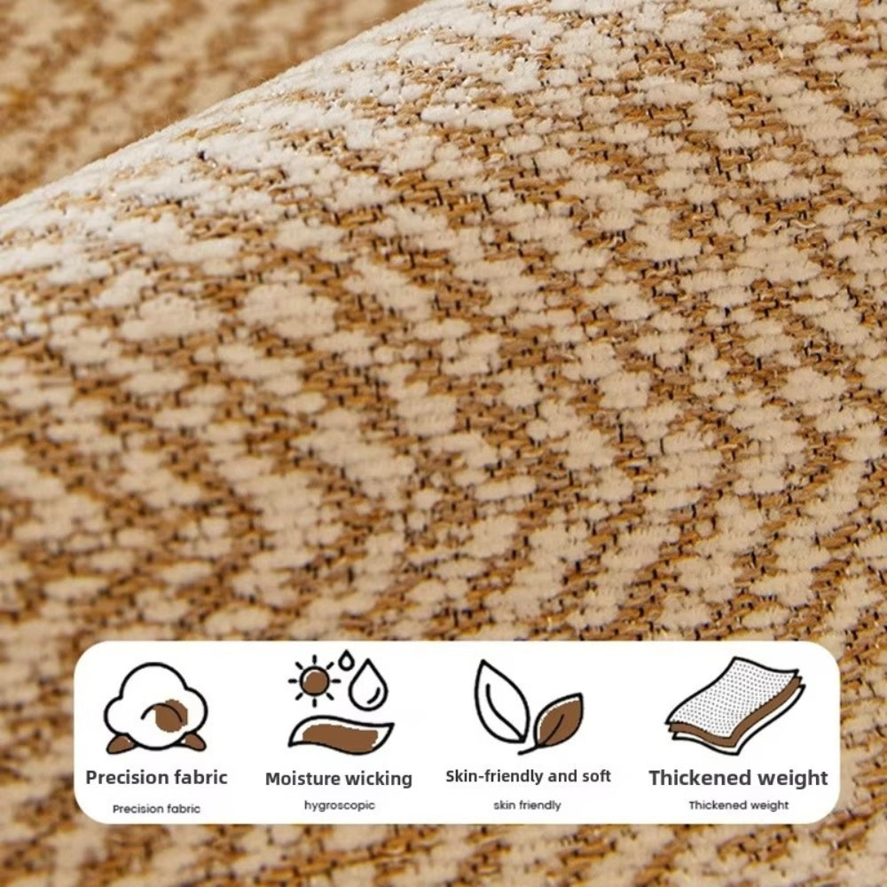 Close view of the herringbone weave with icons for fabric, moisture wicking, soft surface and weight