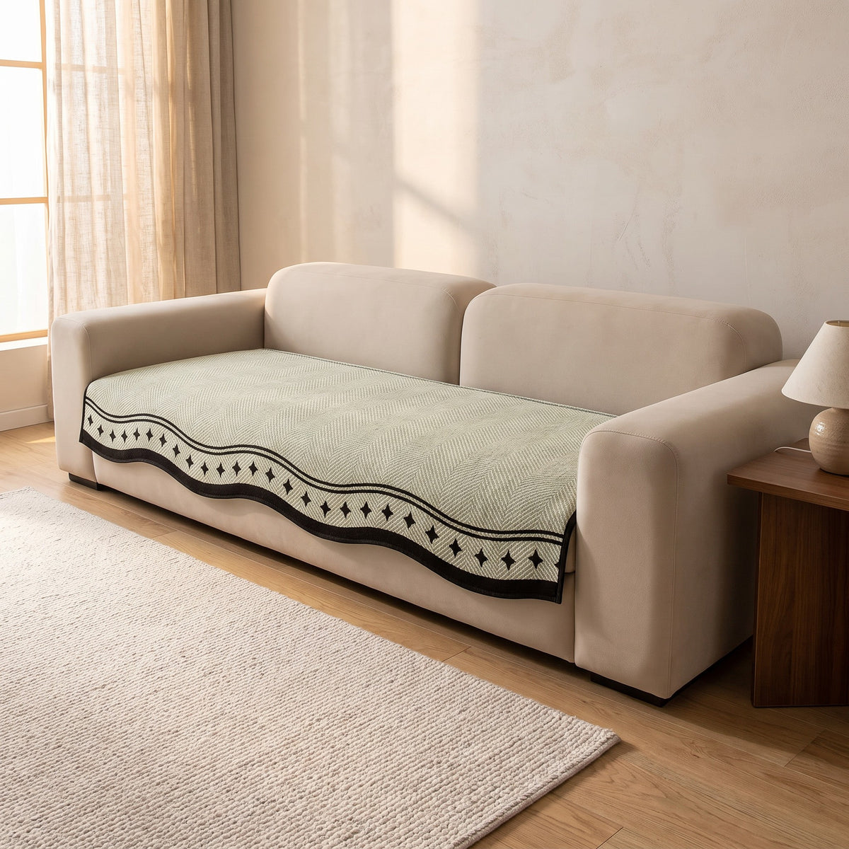 Sofa Cover in Sage on a sofa
