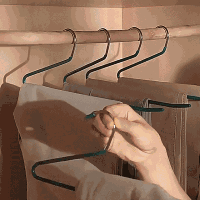 Sliding pants onto Z shape hangers from the open side