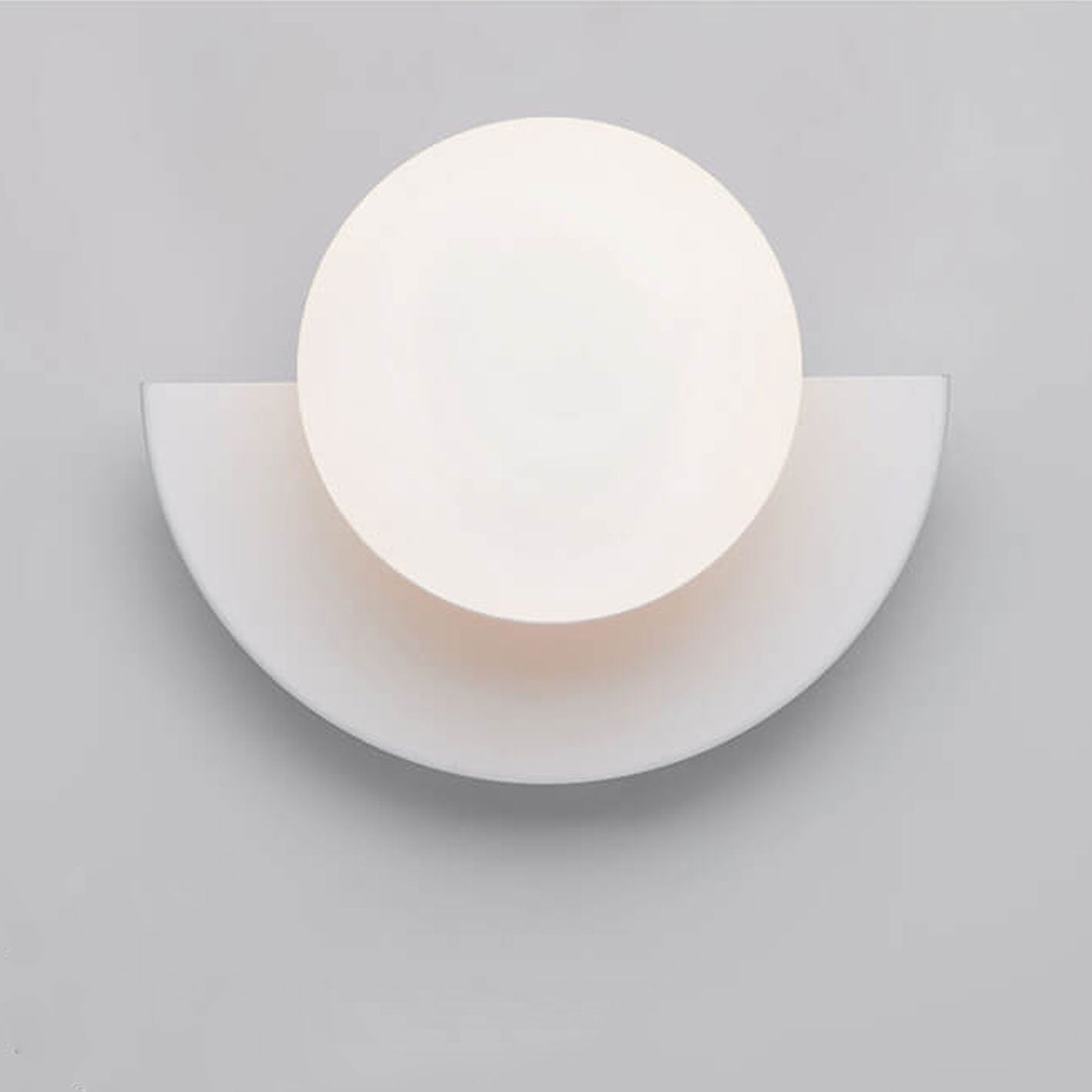 Wall sconce with green glass sphere shade, single G9 light