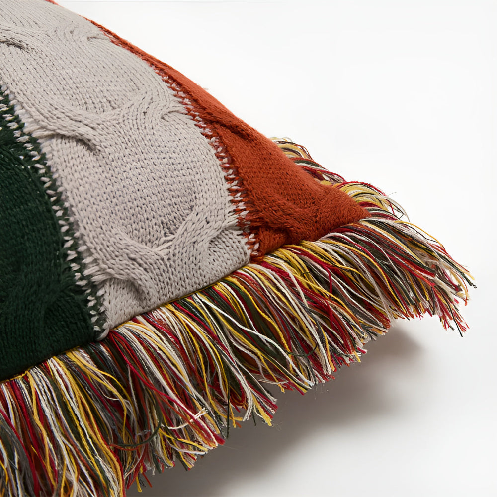 Close view of the cushion fringe and cable knit