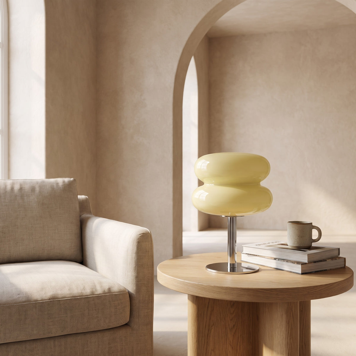 Annika glass table lamp in beige on a round oak side table
