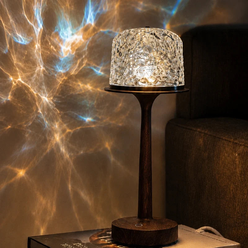 Arvika projector top casting white light patterns on a wall
