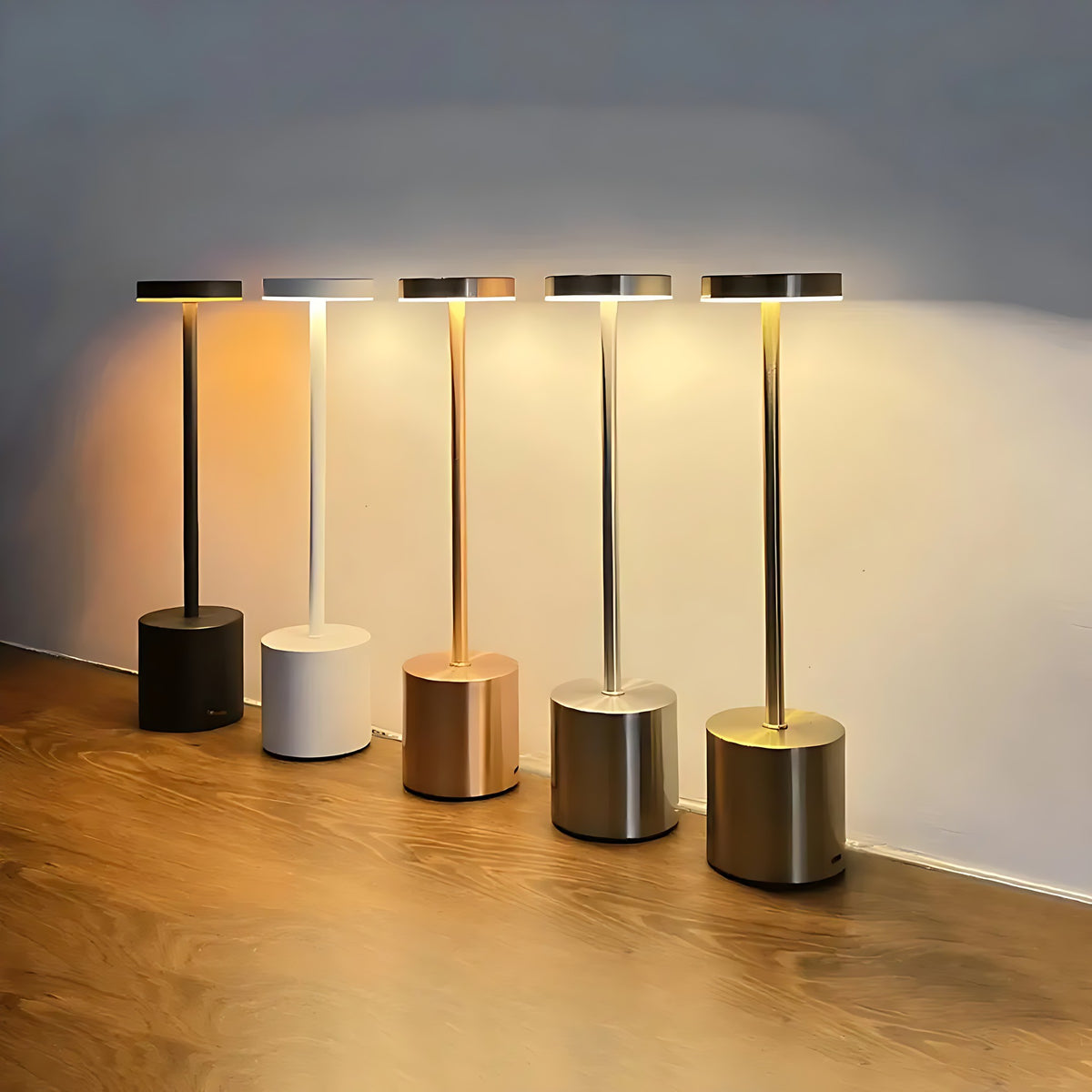 Asta cordless table lamps in black, white, rose, silver and gold, lit