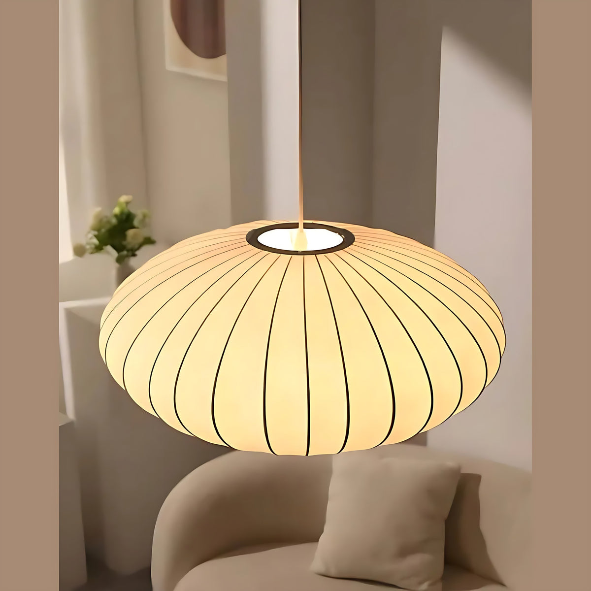 Britt pendant light, ribbed fabric saucer lit, seen from below