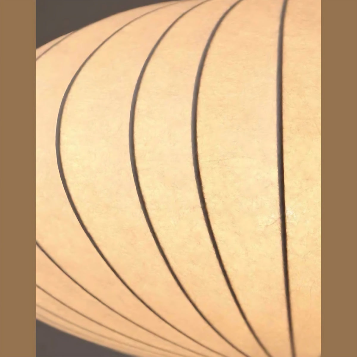 Close view of the fabric stretched between the ribs of the Britt pendant light, ribbed fabric saucer