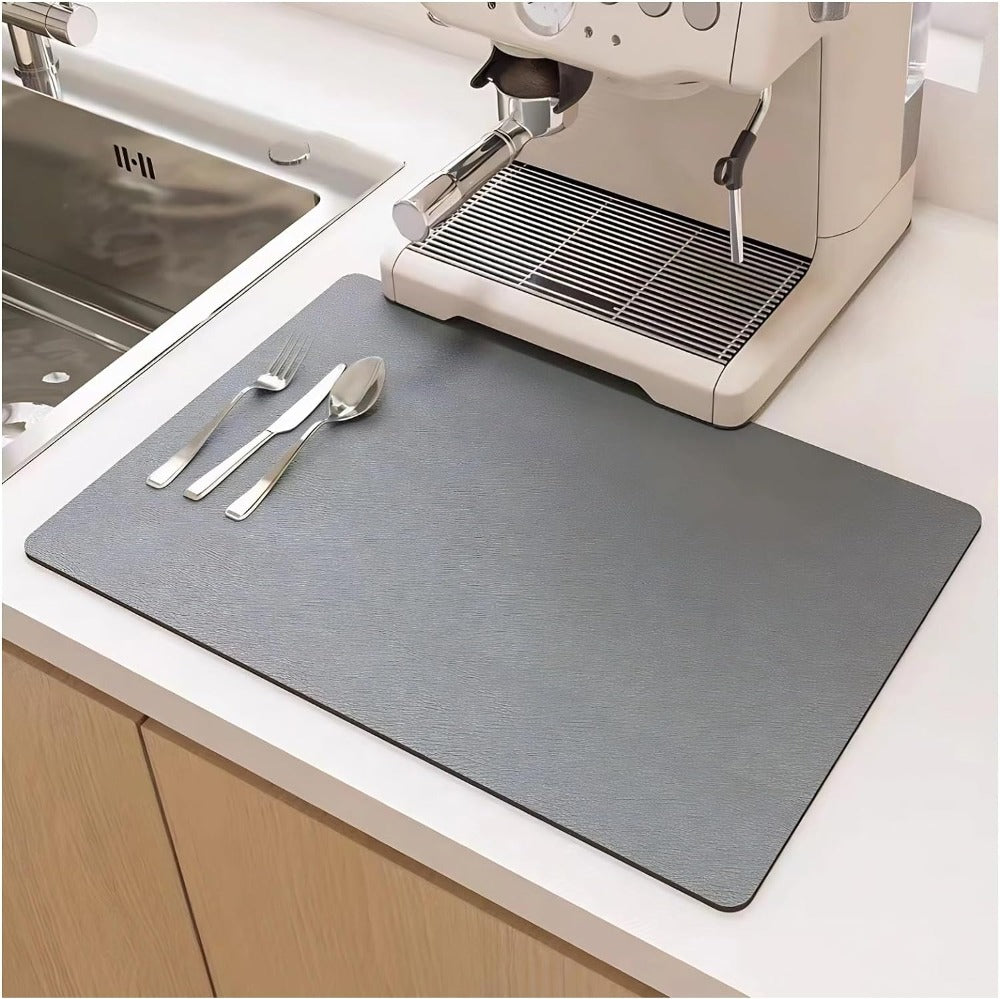 Gray dish drying mat under an espresso machine