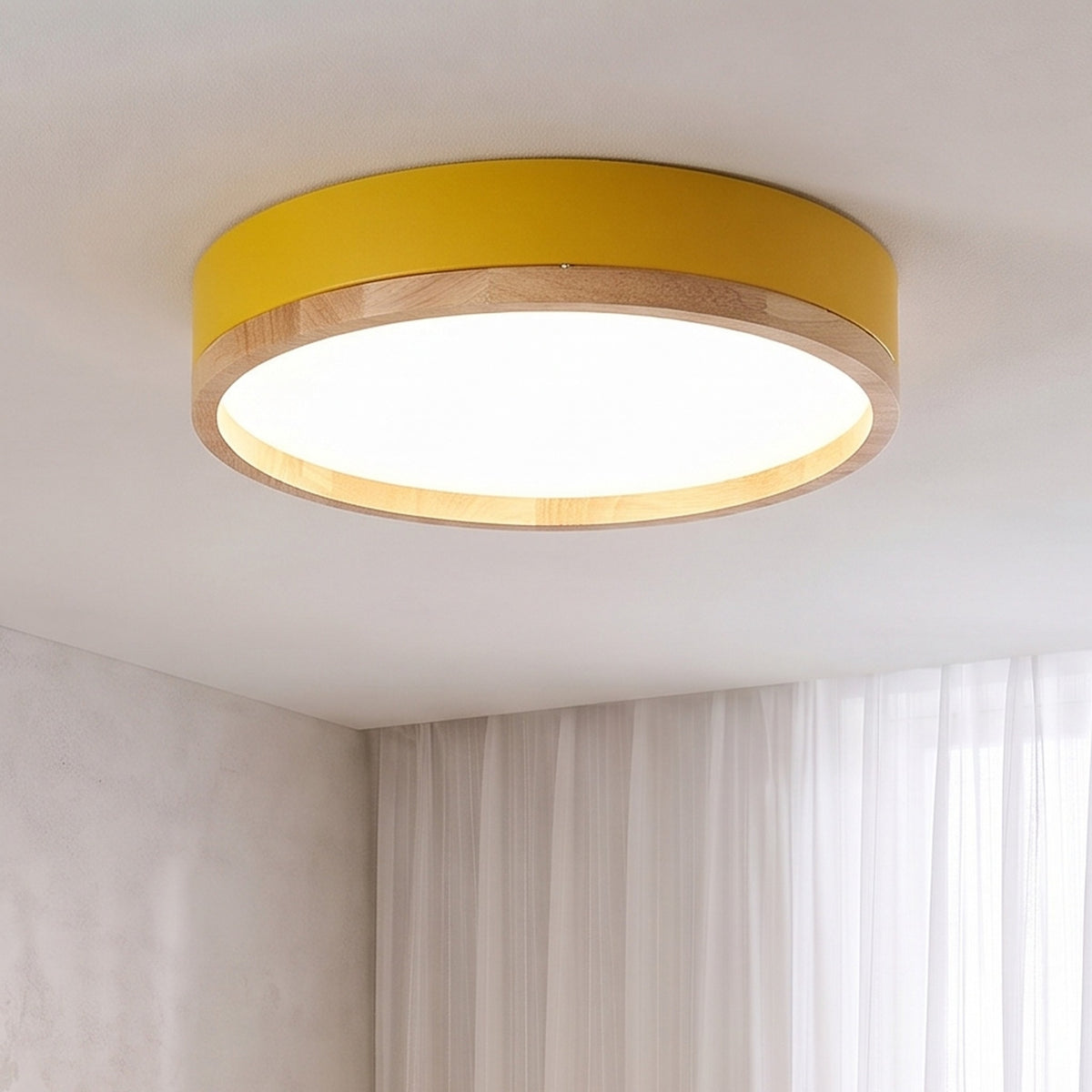 Yellow Eila round ceiling light lit in the same room