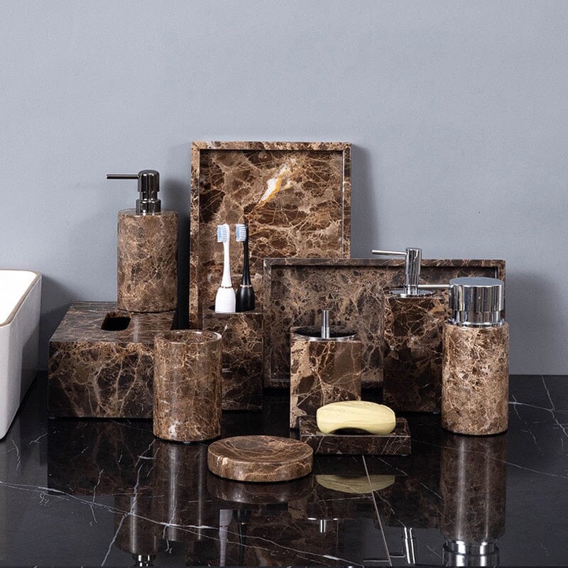 Emperador marble bathroom set with silver hardware on a dark counter