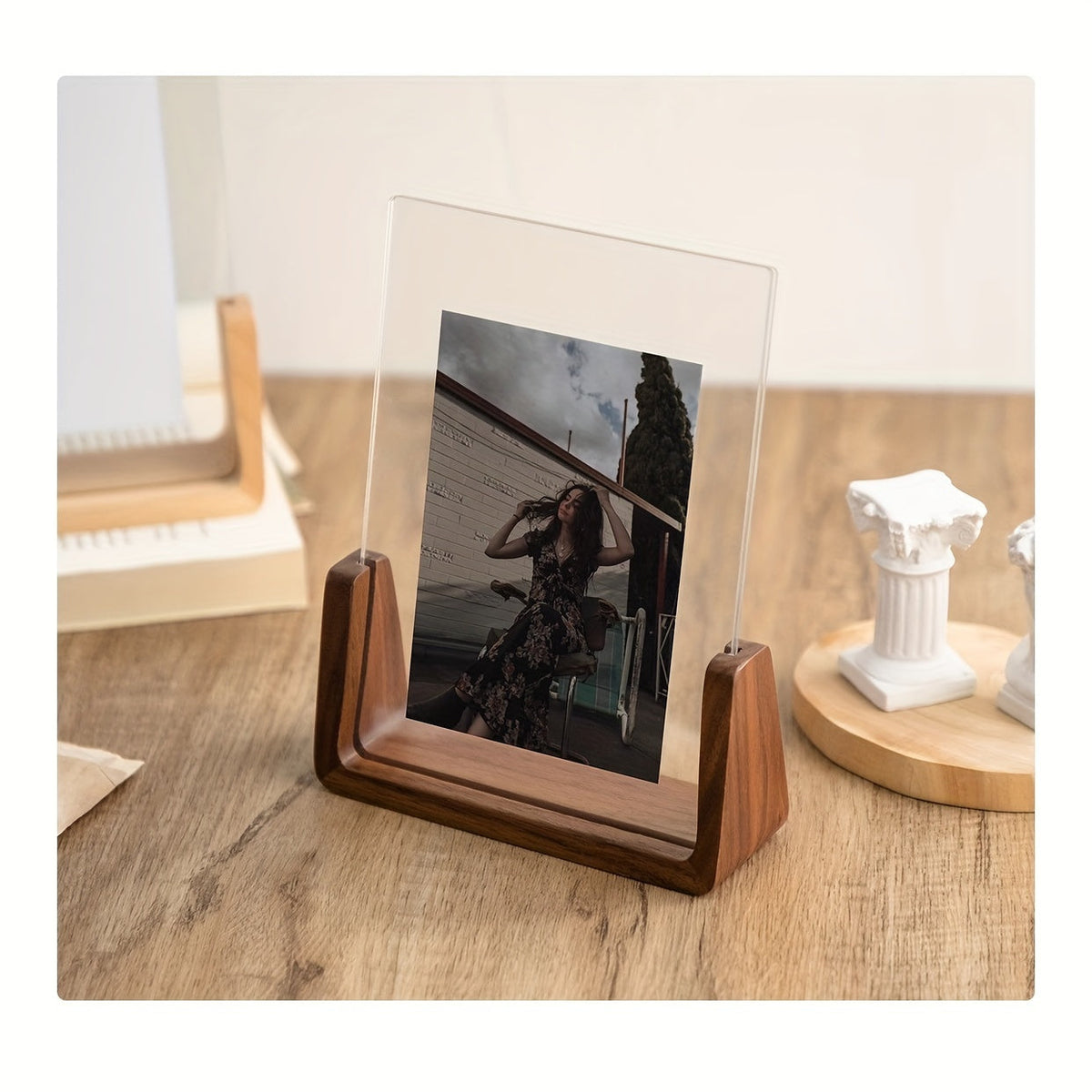Fana walnut frame holding a vertical portrait photo on a wooden table
